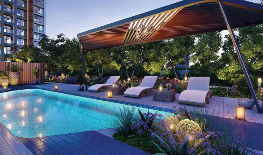 Rooftop infinity pool at 24K Altura, offering a serene luxury experience with scenic views and landscaped surroundings
