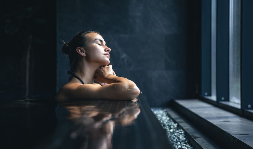 Indoor spa and wellness center with massage rooms and meditation area in a premium apartment building