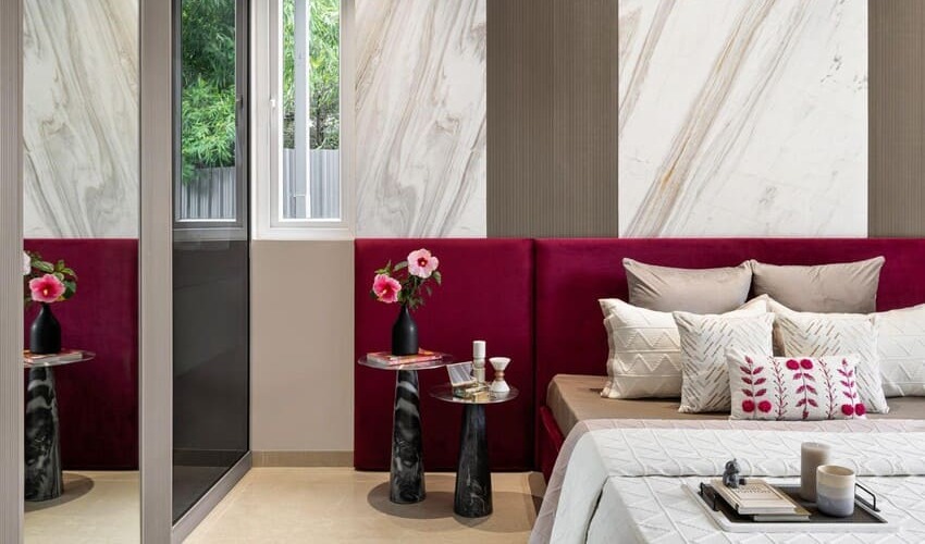 Cozy bedroom with personalized d&eacute;cor, custom art, and warm layered textures.