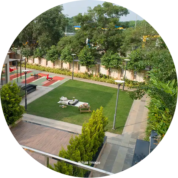 Landscaped gardens surrounding 4 BHK luxury flats in Pune